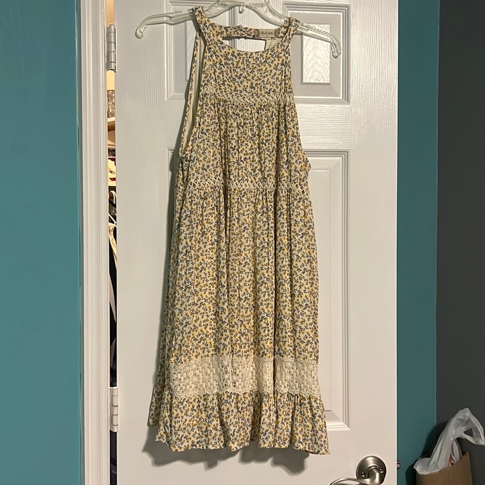 Mini halter dress.  Flower print.  Like new, only worn a few times.  Super cute!